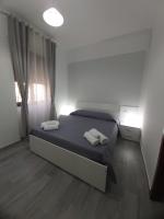 Posteľ alebo postele v izbe v ubytovaní B&B RAFFAELA