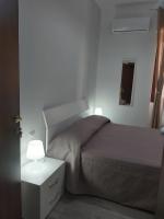 Posteľ alebo postele v izbe v ubytovaní B&B RAFFAELA