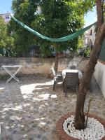 Patio alebo iná vonkajšia časť ubytovania B&B RAFFAELA