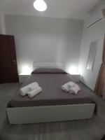 Posteľ alebo postele v izbe v ubytovaní B&B RAFFAELA