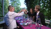a group of people sitting around a table drinking champagne at Tertin Kartano in Mikkeli
