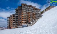 a building on the side of a snow covered slope at Résidence Pierre &amp; Vacances Electra in Avoriaz