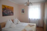 A bed or beds in a room at Haus Thon