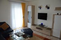 A television and/or entertainment centre at Haus Thon