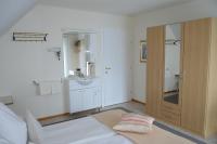 A bed or beds in a room at Haus Thon