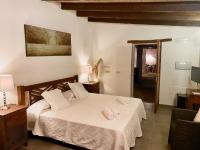 A bed or beds in a room at Can Vich
