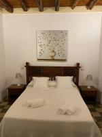 A bed or beds in a room at Can Vich