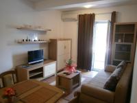 TV a/nebo společenská místnost v ubytování Apartments Toni