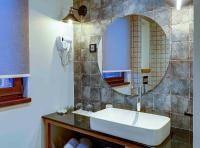 a bathroom with a sink and a mirror at Vlasinsko jezero VILA BEST in Surdulica