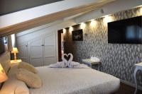 Postel nebo postele na pokoji v ubytování Hotel Spa San Marcos