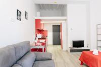 Televízia a/alebo spoločenská miestnosť v ubytovaní Apartamentos Tito San Nicolas