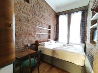 A bed or beds in a room at Casa 1899