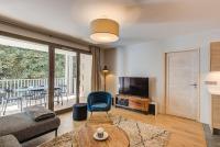 Televízia a/alebo spoločenská miestnosť v ubytovaní White Pearl A13 - Alpes Travel - Central Chamonix (Sleeps 6)