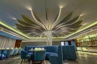 Posezení v ubytování Regenta Central Javaji Mysore