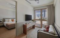 21 Carpenter, Singapore, a Member of Design Hotelsにあるテレビまたはエンターテインメントセンター