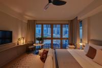 21 Carpenter, Singapore, a Member of Design Hotelsにあるベッド