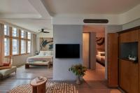 21 Carpenter, Singapore, a Member of Design Hotelsにあるテレビまたはエンターテインメントセンター