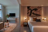 21 Carpenter, Singapore, a Member of Design Hotelsにあるベッド