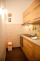Kuchyň nebo kuchyňský kout v ubytování Apartment Adriana