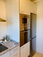Kuchyň nebo kuchyňský kout v ubytování Apartament dúplex amb vistes al Pirineu català