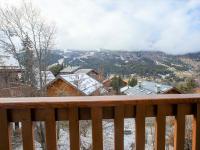a view of a snowy mountain from a deck at Appartement Méribel, 3 pièces, 6 personnes - FR-1-688-36 in Méribel