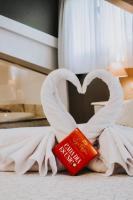 Postel nebo postele na pokoji v ubytování Hotel Spa San Marcos