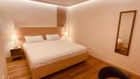 Postel nebo postele na pokoji v ubytování Hotel La Colonia
