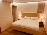 Postel nebo postele na pokoji v ubytování Hotel La Colonia