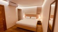 Postel nebo postele na pokoji v ubytování Hotel La Colonia