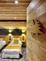 Ein Bett oder Betten in einem Zimmer der Unterkunft Hameau des Prodains - H&ocirc;tel