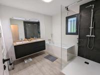 a bathroom with a tub and a sink and a shower at Maison au calme dominant la ville d&#39;Evreux in Évreux