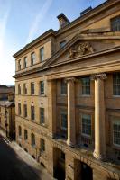 a large brick building with columns on the side of it at The Gainsborough Bath Spa - Small Luxury Hotels of the World in Bath