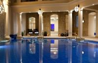 a swimming pool in a building with a lobby at The Gainsborough Bath Spa - Small Luxury Hotels of the World in Bath