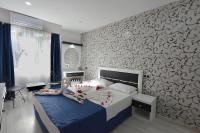 Postel nebo postele na pokoji v ubytování La Rezidans Hotel
