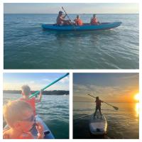 three pictures of people on a paddle board in the water at Manava Villa vue mer et Mont Saint Michel piscine intérieure in Saint-Jean-le-Thomas