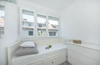 Postel nebo postele na pokoji v ubytování City Smart Apartment