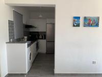 Kuchyň nebo kuchyňský kout v ubytování Paradise Gardens 3 - superb 1 bed apartment