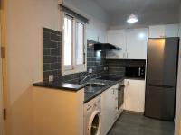 Kuchyň nebo kuchyňský kout v ubytování Paradise Gardens 3 - superb 1 bed apartment