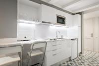 Kuchyň nebo kuchyňský kout v ubytování Uma Suites Sagrada Familia