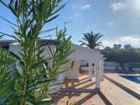 Bazén v ubytování Jávea Villa entière piscine et cuisine d'été à pinosol nebo v jeho okolí