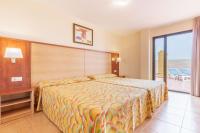 Posteľ alebo postele v izbe v ubytovaní Apartamentos Best Alcazar