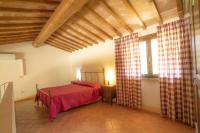 A bed or beds in a room at La Sorgente