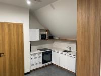 Kuchyňa alebo kuchynka v ubytovaní Apartamenty przy Parku Szwedzkim
