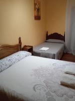 A bed or beds in a room at Apartamento Cerro De Las Salinas