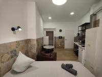 Kuchyň nebo kuchyňský kout v ubytování РUEВLO МAR, hotel-apartamento