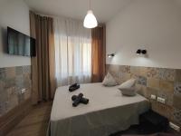 Postel nebo postele na pokoji v ubytování РUEВLO МAR, hotel-apartamento