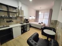 Kuchyň nebo kuchyňský kout v ubytování РUEВLO МAR, hotel-apartamento