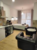 Postel nebo postele na pokoji v ubytování РUEВLO МAR, hotel-apartamento