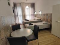 Postel nebo postele na pokoji v ubytování РUEВLO МAR, hotel-apartamento