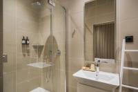 a bathroom with a shower and a sink at Maison Nô - Hôtel et Rooftop in Lyon